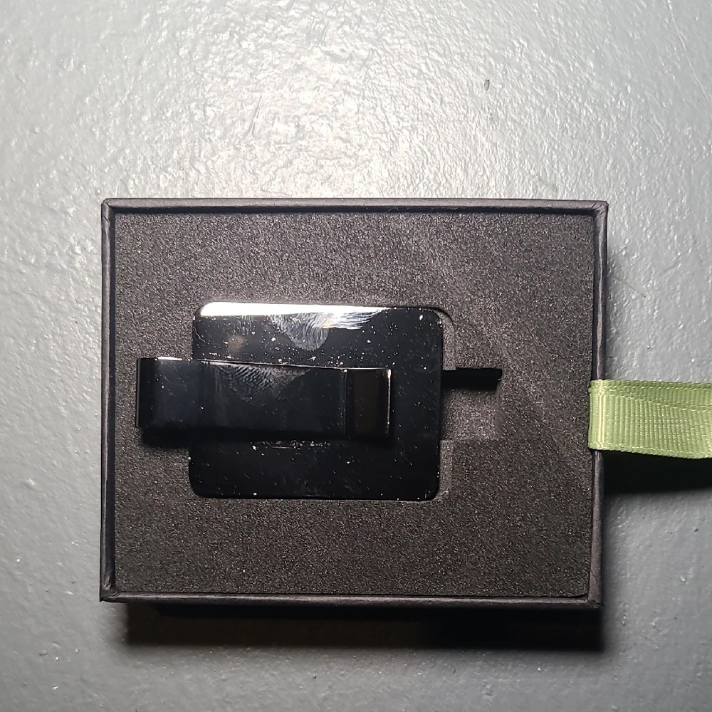 Green Keychain with 'Never Change' Inscription